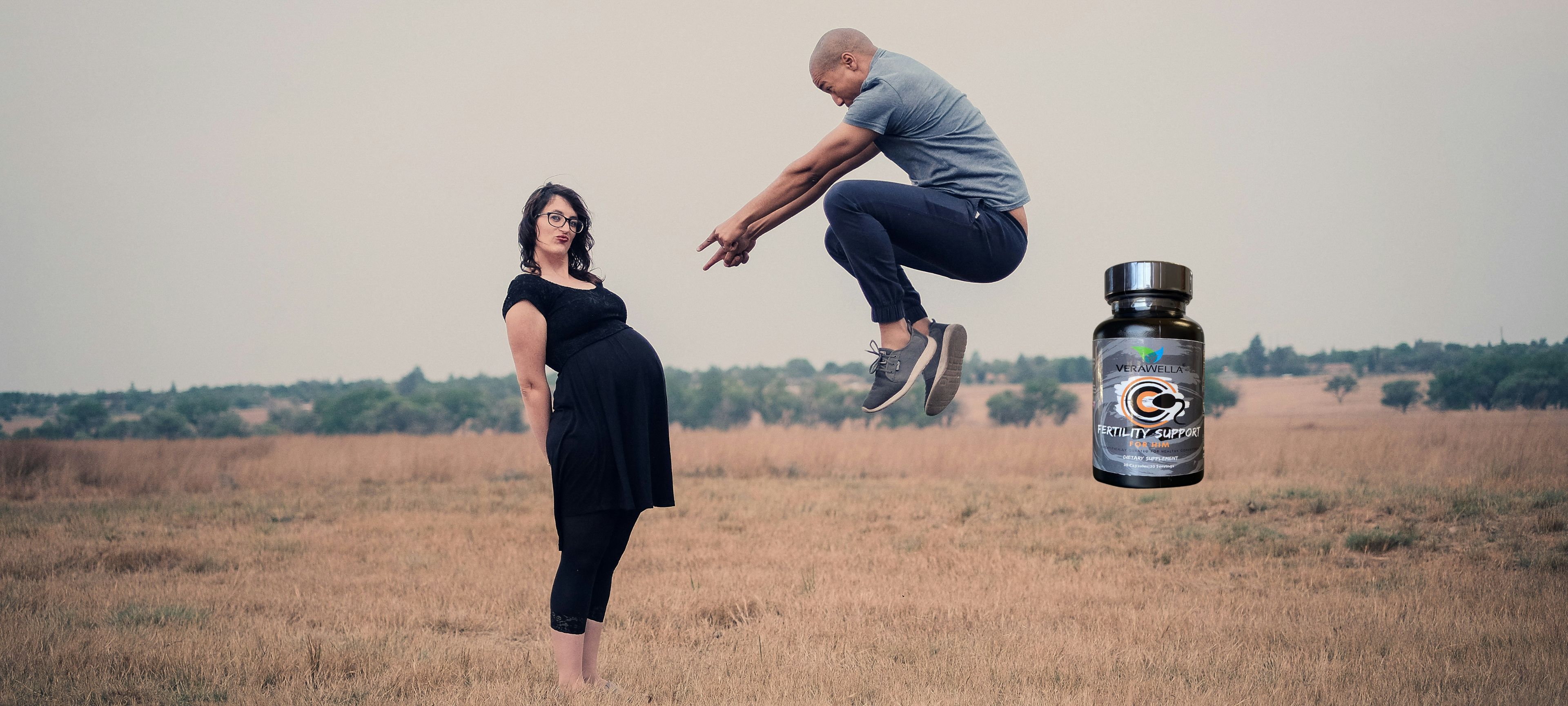 A happy man jumping for joy and pointing to his pregnant wife as they celebrate the announcement of their pregnancy. Glucose Support benefit slide, fat loss, weight loss, blood sugar, insulin resistance, carbohydrates, ketosis, ketones, antiaging, longevity, fatty liver, pcos. ozempic and metformin.